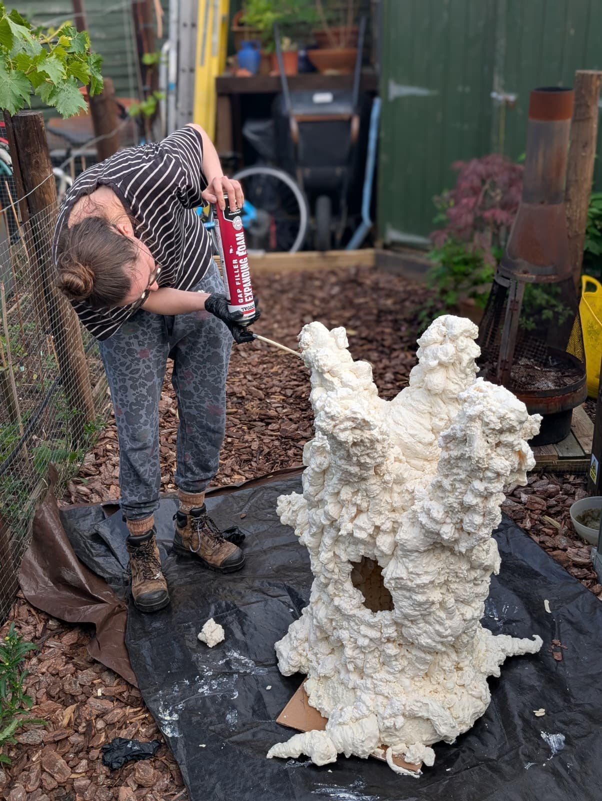 Filler foam going on over the chicken wire.