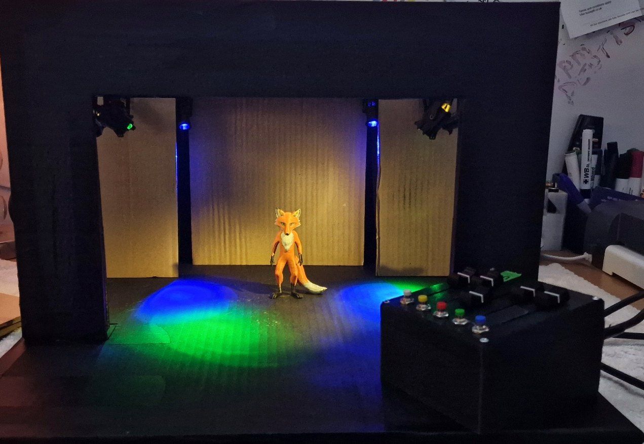 StoryBox mini-stage with a fox figure, LED lighting and a control box